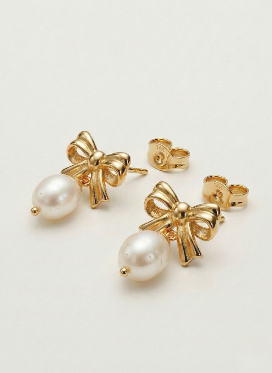 זוג עגילי פפיון פנינה זהב