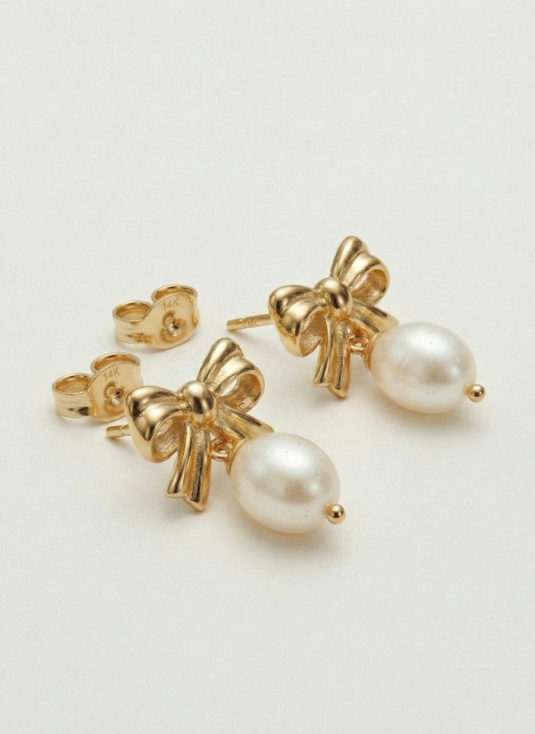 זוג עגילי פפיון פנינה זהב